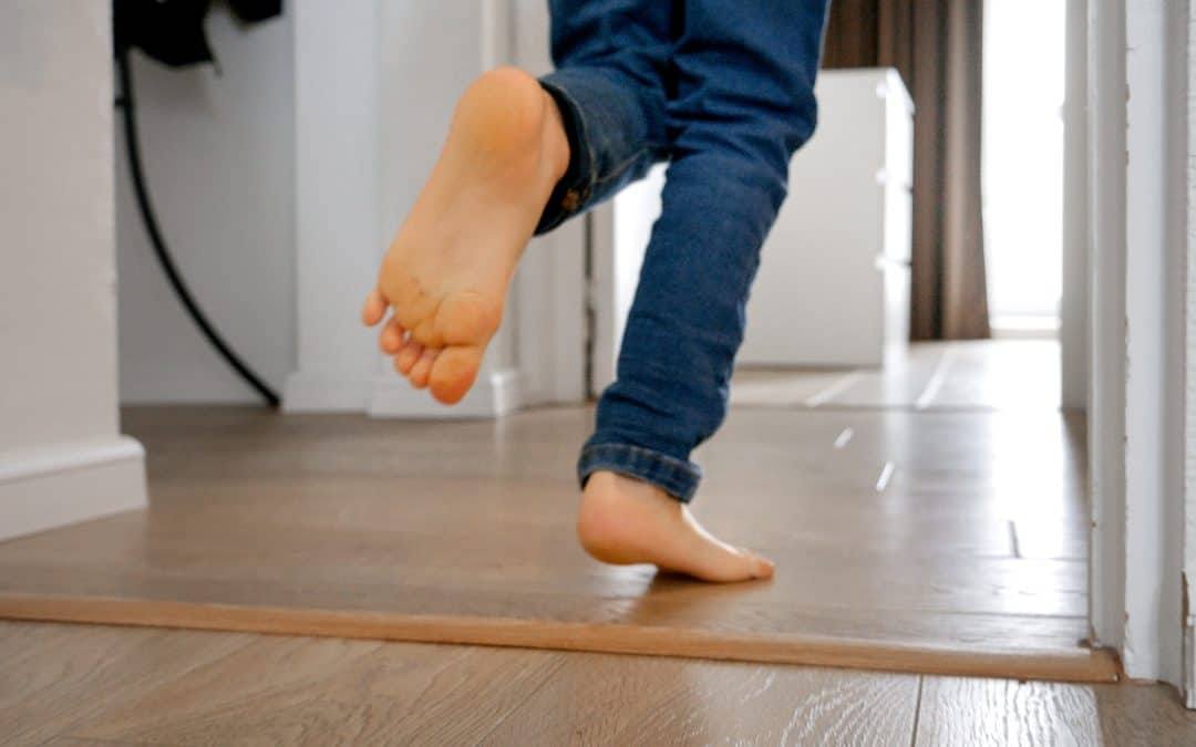 Stop Tripping- Proper Floor Transitions...-little-boy-running-down-a-long-wooden-corridor-at-2025