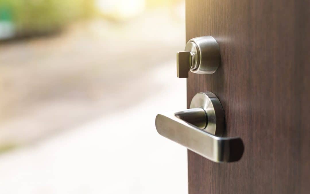 Swap Your Door Knobs...-open-the-modern-wooden-door-with-metal-door-handle Large